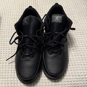 Black leather with canvas tongue size 7y Nike